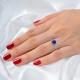 Round Cut Tanzanite and Diamond Ring (0.21 ctw)