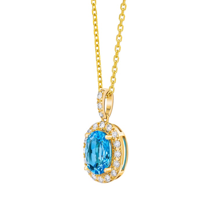 Oval Shaped Blue Topaz and Diamond Pendant (0.25 ctw)
